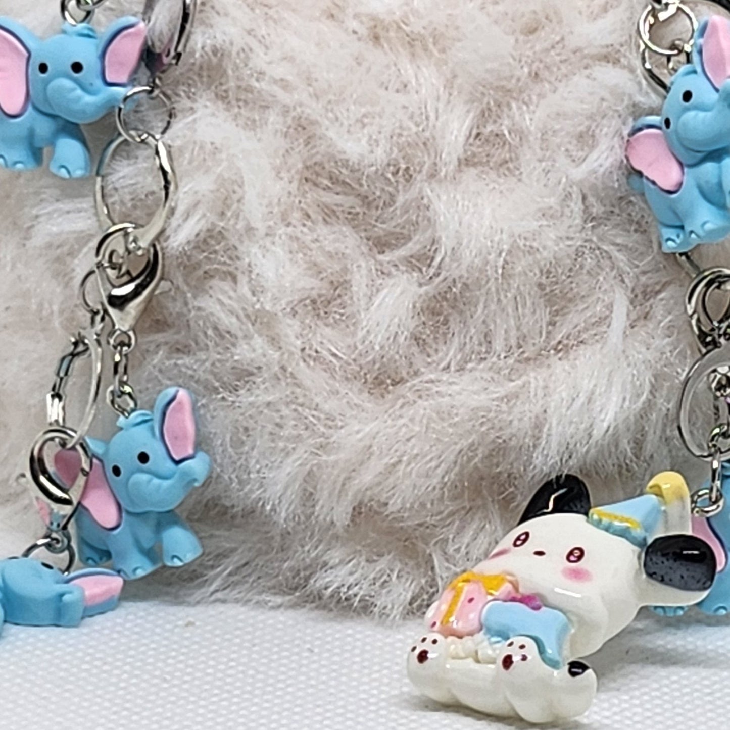 Compte Rang Pochacco et ses éléphants (Sanrio)